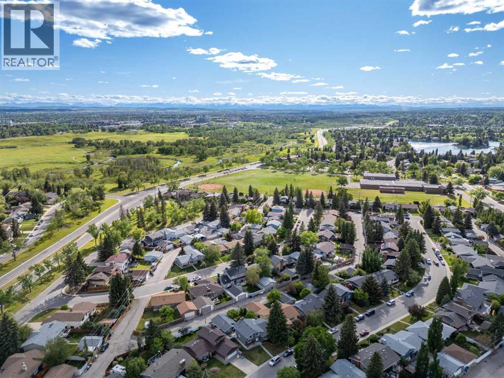 Single Family House Bi-level for Sale in  Lake Crimson Drive SE Lake Bonavista Calgary 