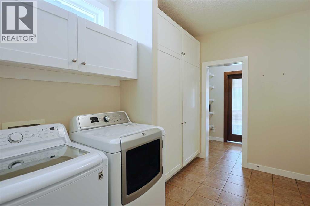 Single Family House for Sale in  Tuscany Estates Drive NW Tuscany Calgary 