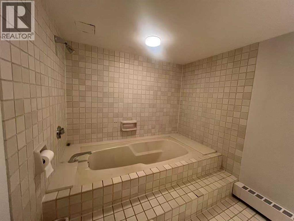 Single Family House for Sale in A  EAU CLAIRE Avenue SW Eau Claire Calgary 