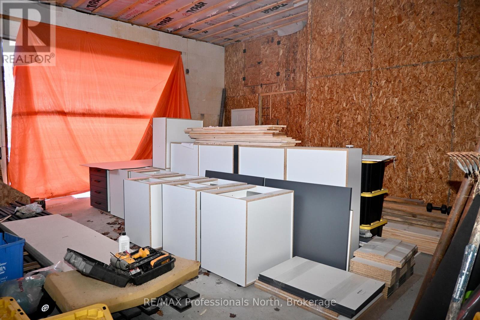 Kitchen Cabinets on site in garage