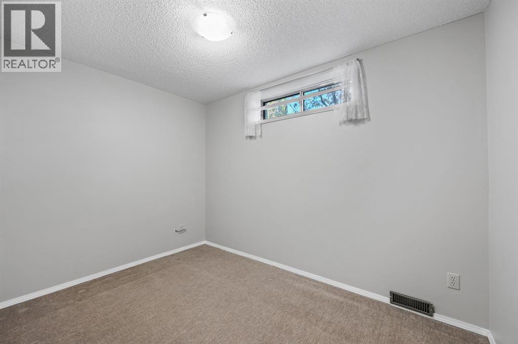 Single Family House for Sale in  Coach Side Terrace SW Coach Hill Calgary 