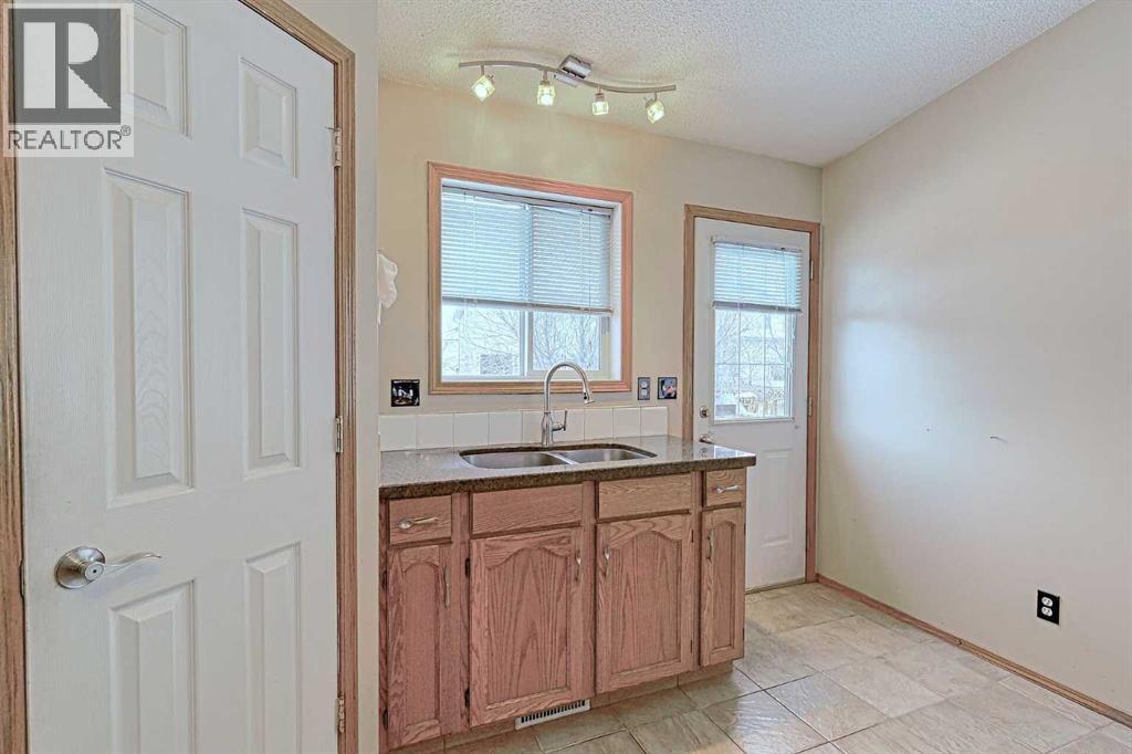 Single Family House Bungalow for Sale in  Coventry Crescent NE Coventry Hills Calgary 