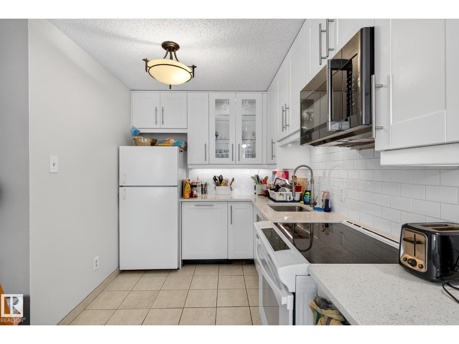 #202 9916 113 ST NW - 18