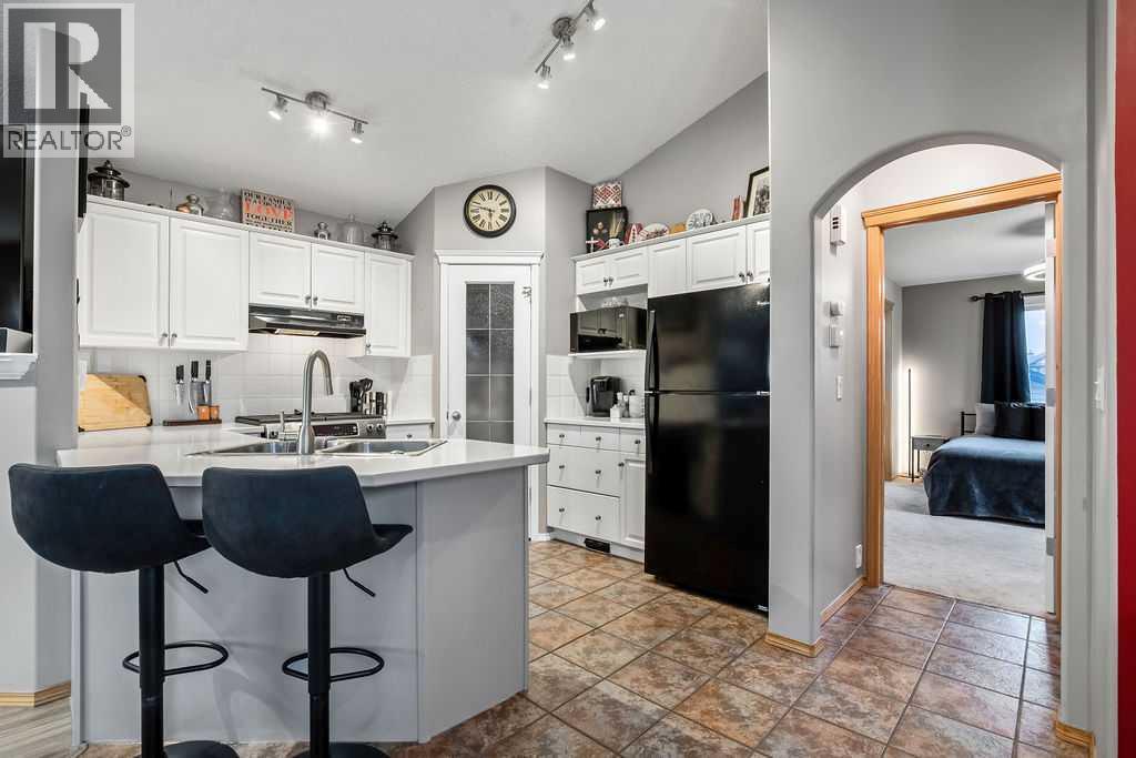 Single Family House Bi-level for Sale in  Cramond Crescent SE Cranston Calgary 