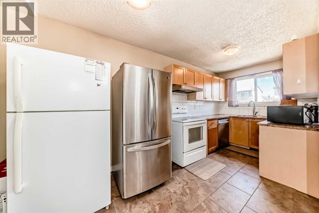 Single Family House for Sale in  Pinemill Mews NE Pineridge Calgary 