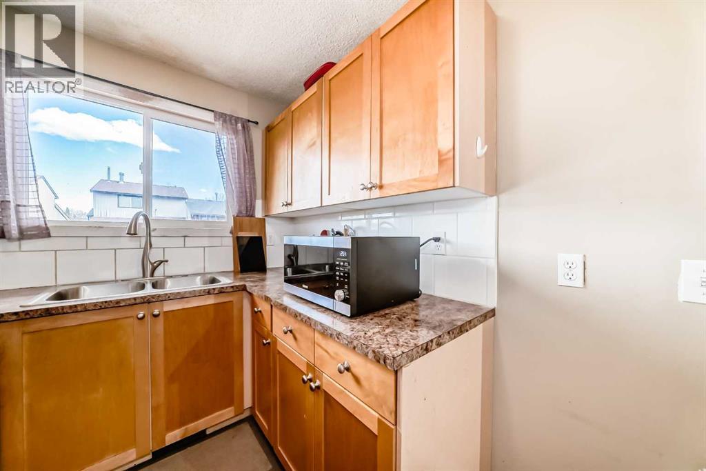 Single Family House for Sale in  Pinemill Mews NE Pineridge Calgary 