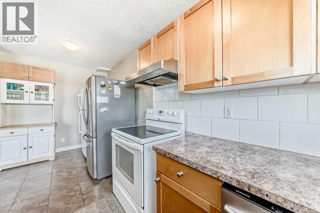 Single Family House for Sale in  Pinemill Mews NE Pineridge Calgary 