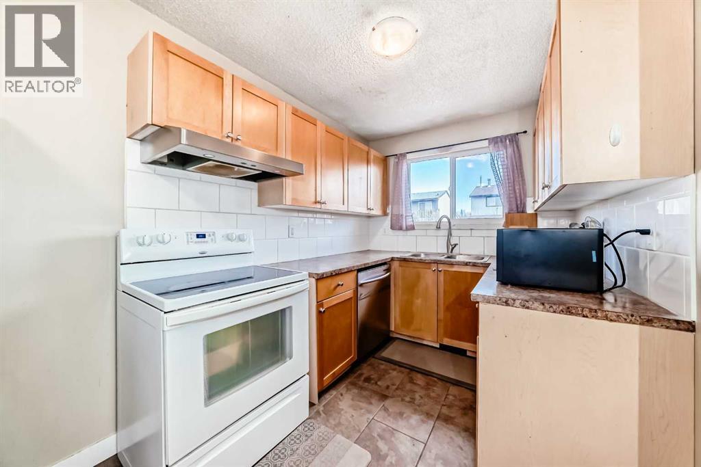 Single Family House for Sale in  Pinemill Mews NE Pineridge Calgary 