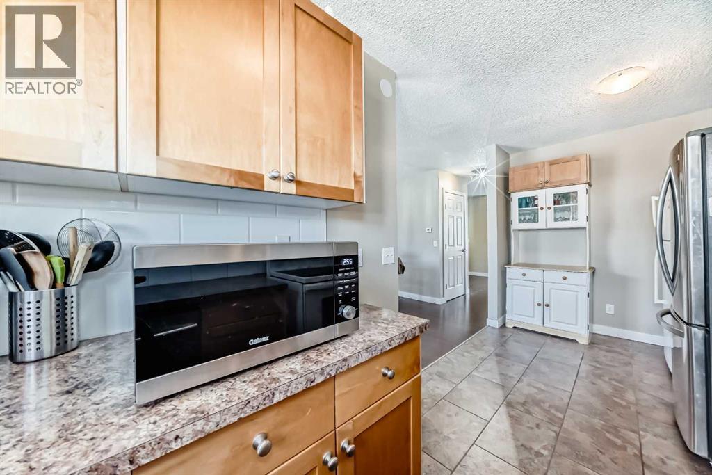 Single Family House for Sale in  Pinemill Mews NE Pineridge Calgary 