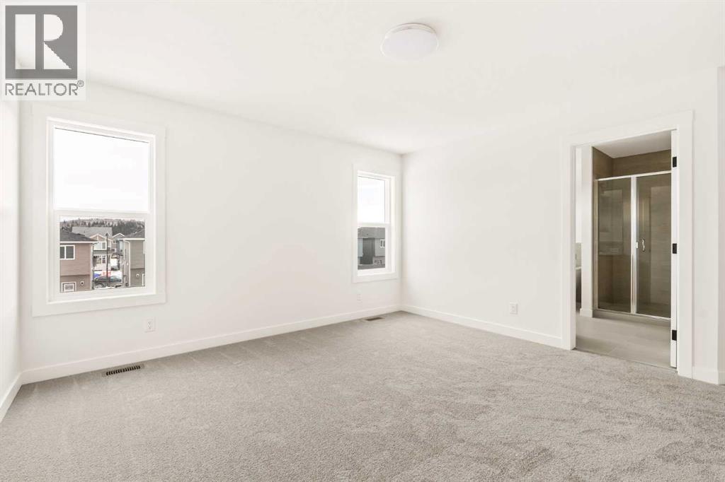 Single Family House 4 Level for Sale in  Creekstone Circle SW Pine Creek Calgary 