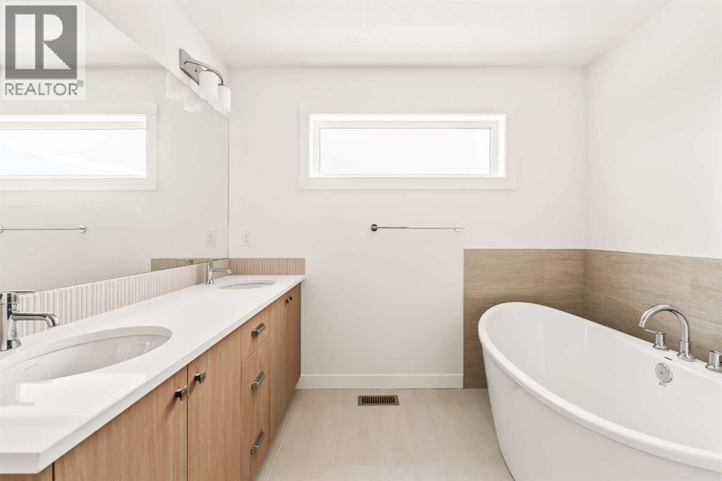 Single Family House 4 Level for Sale in  Creekstone Circle SW Pine Creek Calgary 