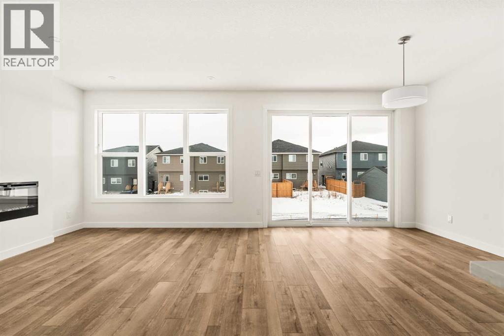 Single Family House 4 Level for Sale in  Creekstone Circle SW Pine Creek Calgary 