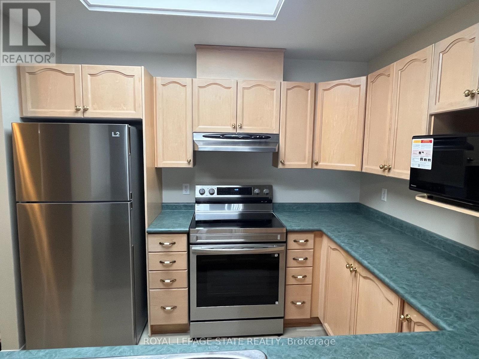 #203 210 MAIN STREET E - 14