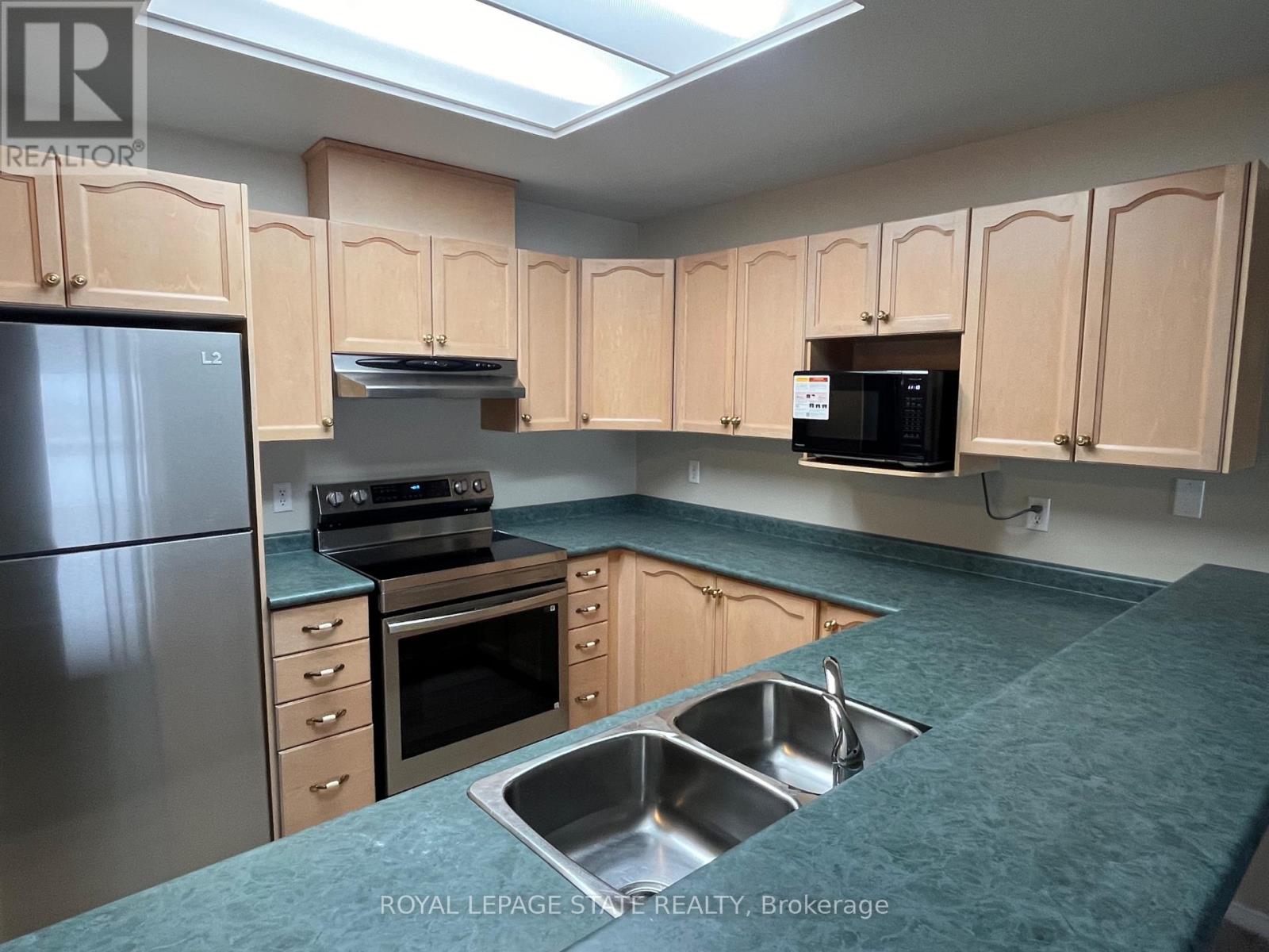 #203 210 MAIN STREET E - 15