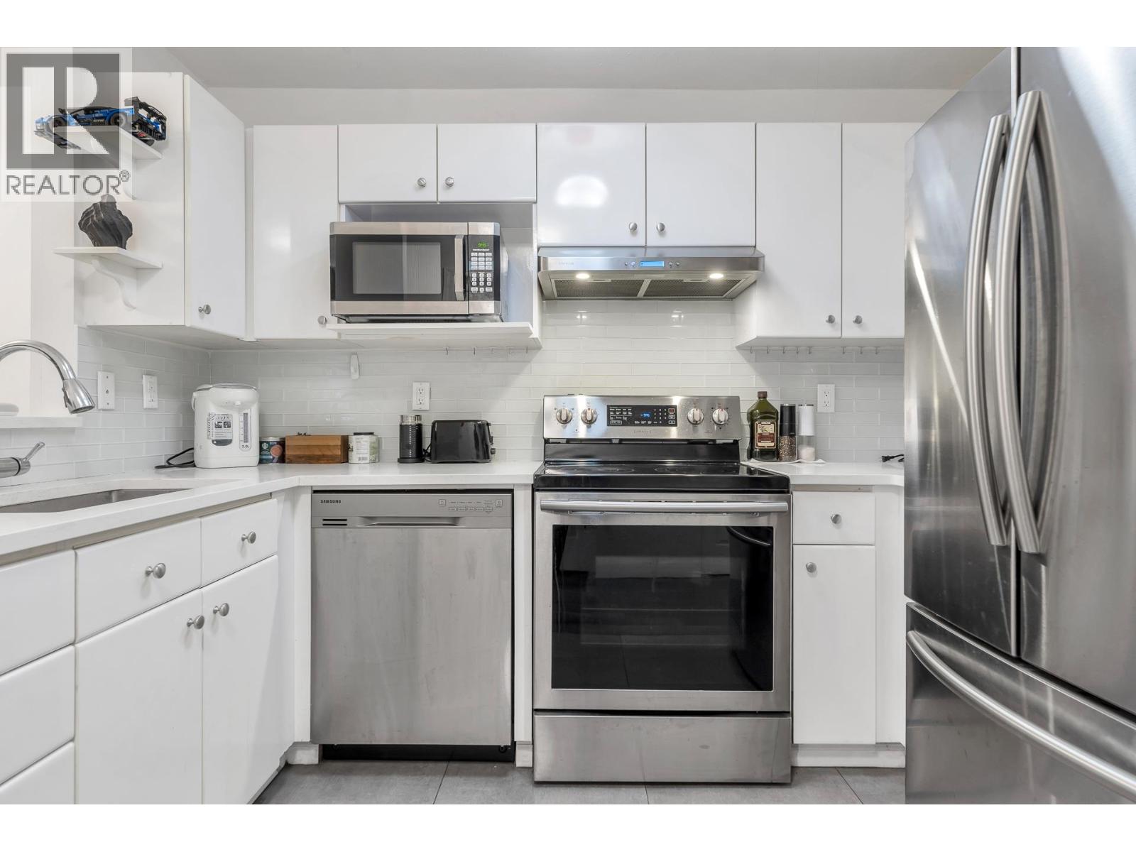 203 8611 GENERAL CURRIE ROAD, Richmond