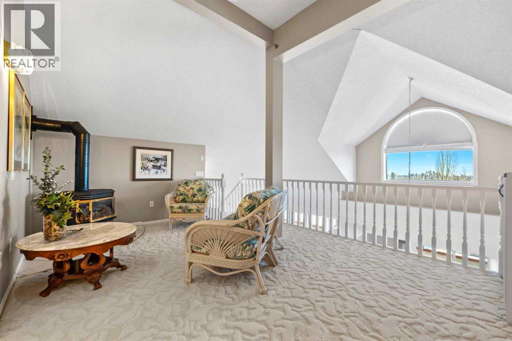 Single Family House Multi-level for Sale in   Simcoe Boulevard SW Signal Hill Calgary 