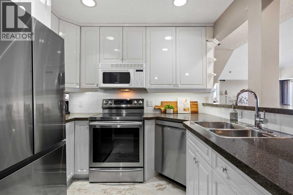 Single Family House Multi-level for Sale in   Simcoe Boulevard SW Signal Hill Calgary 