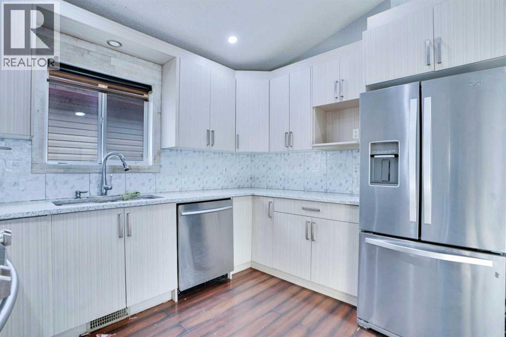 Single Family House Bi-level for Sale in  Taracove Estate Drive NE Taradale Calgary 