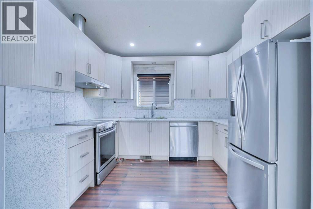 Single Family House Bi-level for Sale in  Taracove Estate Drive NE Taradale Calgary 