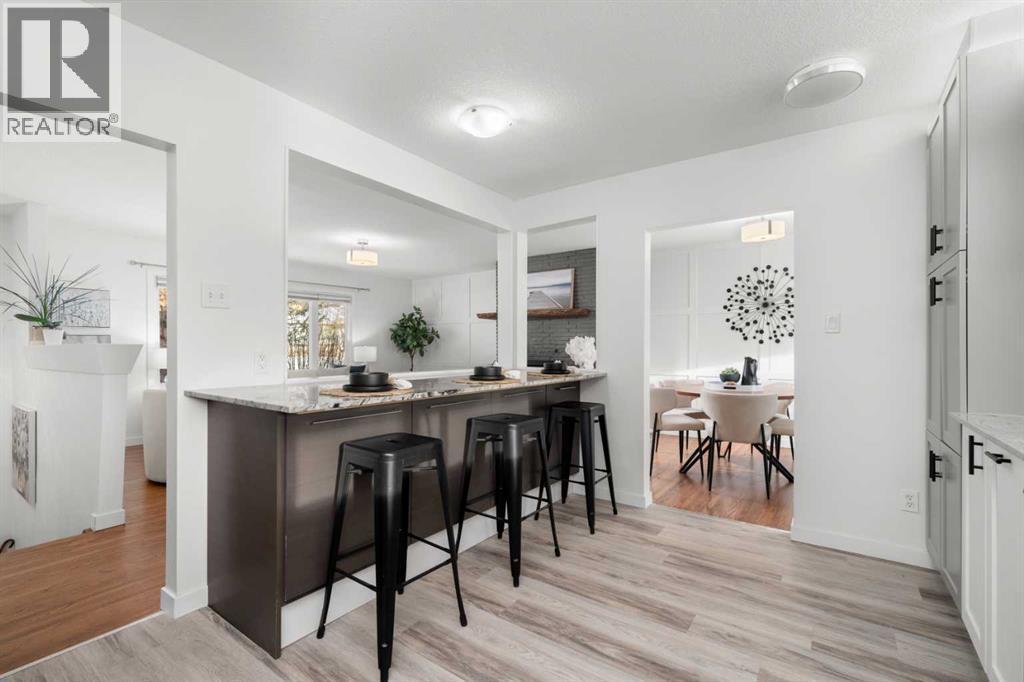 Single Family House Bi-level for Sale in  Bearspaw Drive NW Brentwood Calgary 