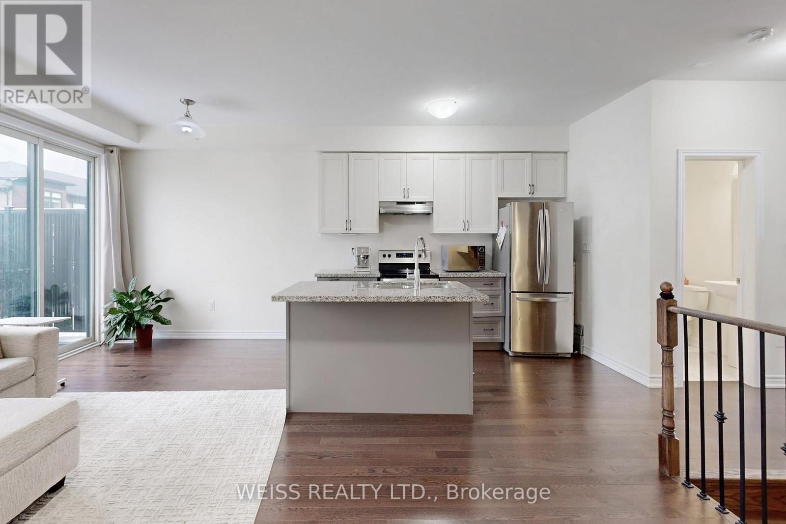 6729 THICKSON ROAD N - 7