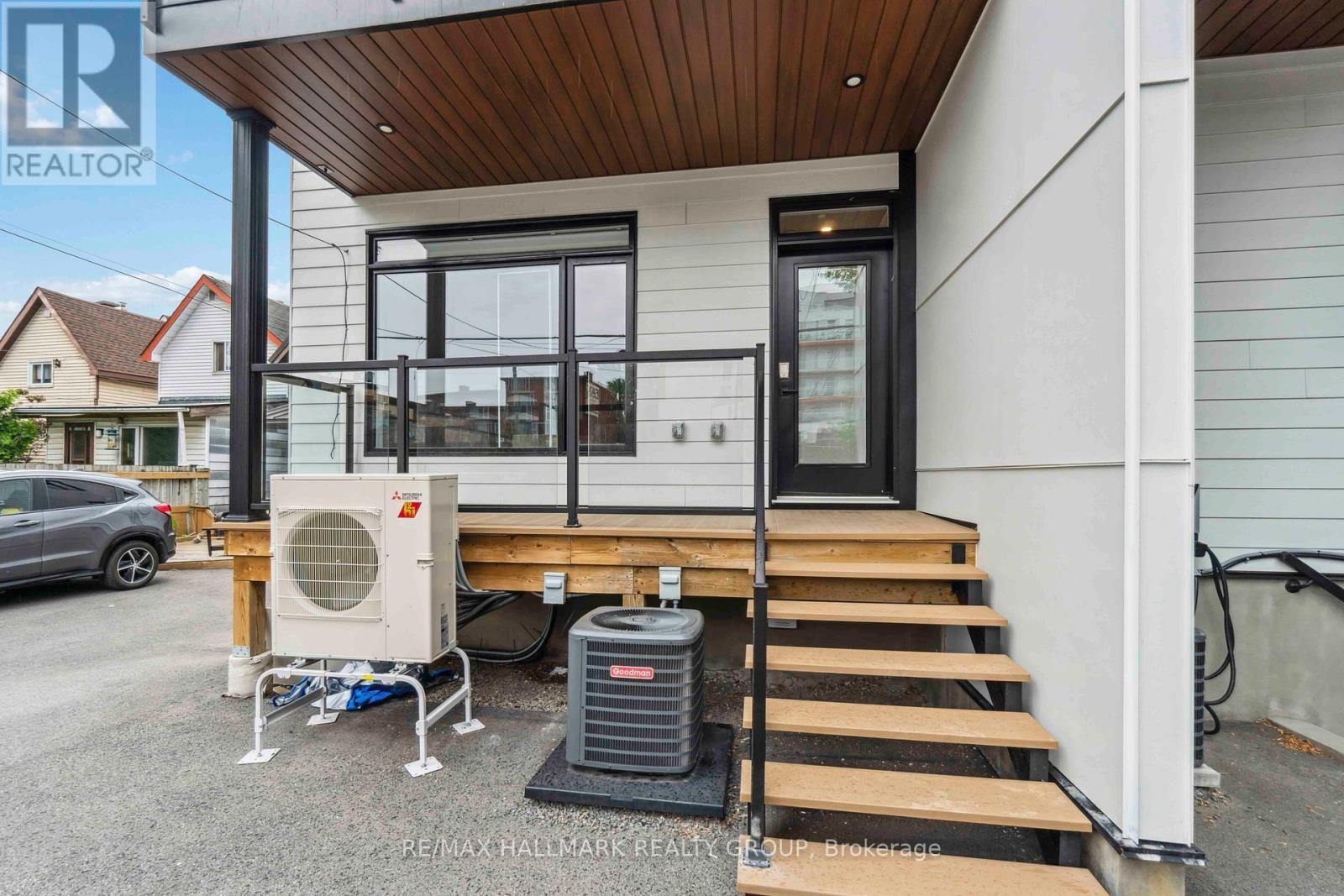 Entrance to Unit E located at back of building.