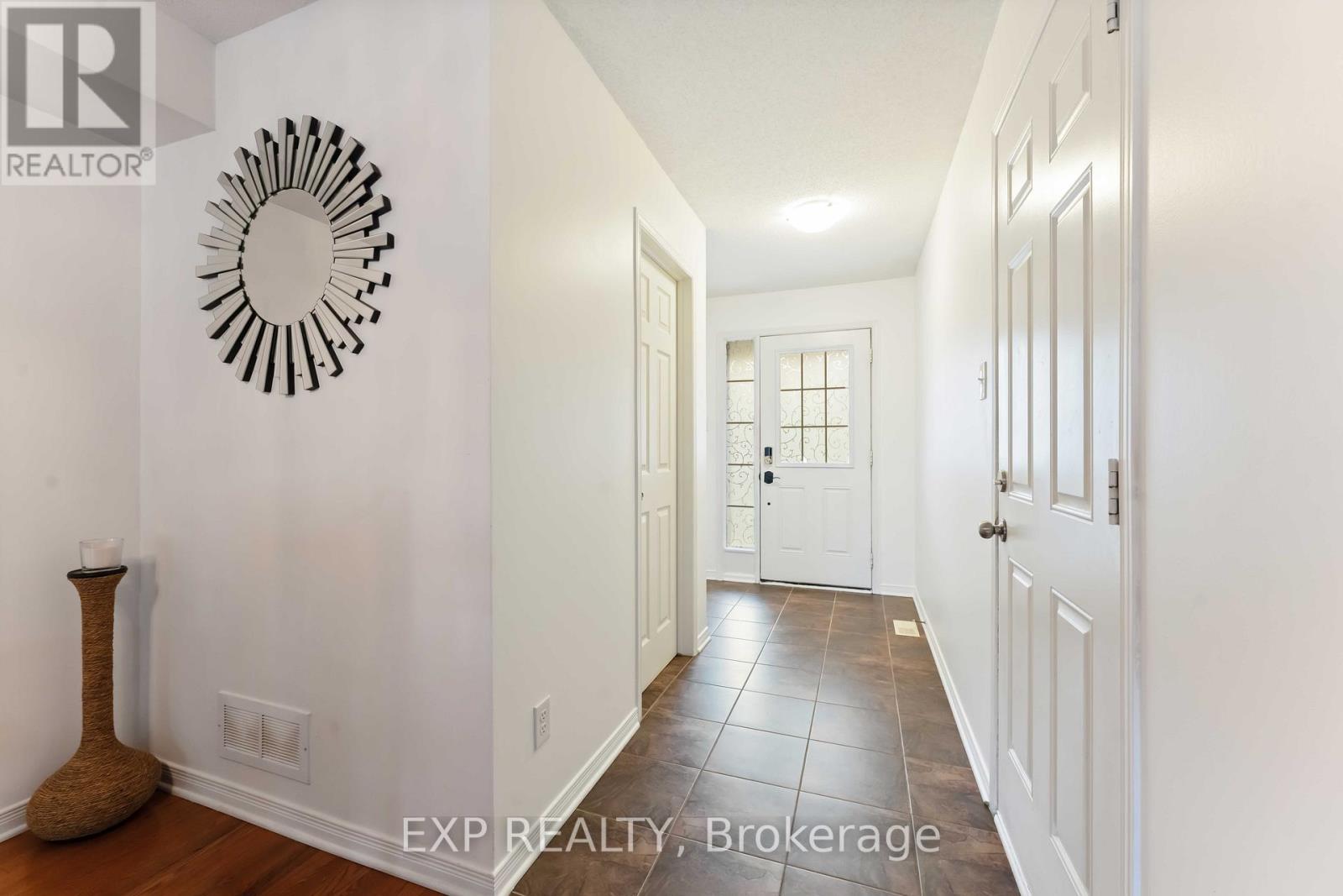 Spacious bright foyer w/inside access from garage