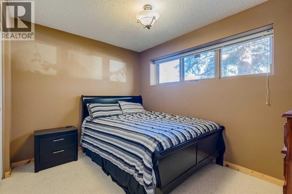 Single Family House Bi-level for Sale in  Midcrest Crescent SE Midnapore Calgary 