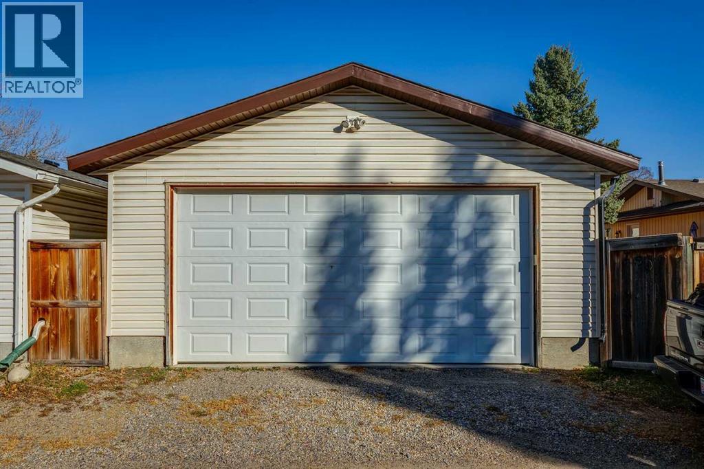 Single Family House Bi-level for Sale in  Midcrest Crescent SE Midnapore Calgary 