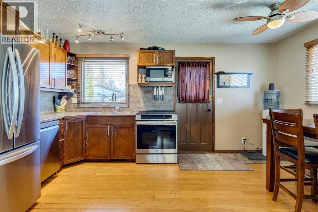 Single Family House Bi-level for Sale in  Midcrest Crescent SE Midnapore Calgary 