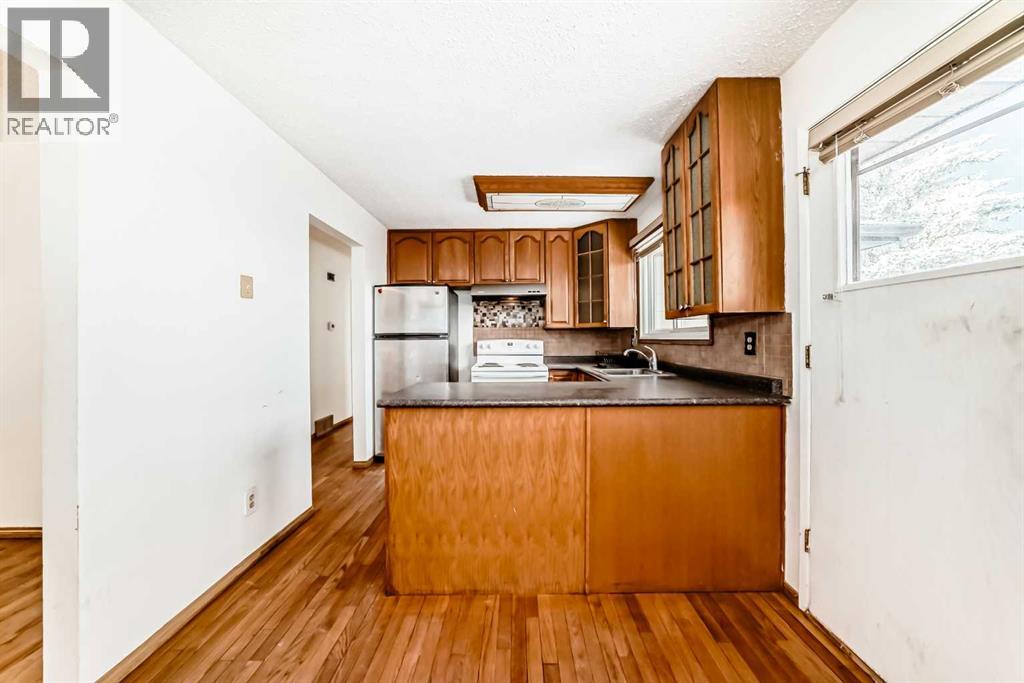 Single Family House Bi-level for Sale in  Falwood Way NE Falconridge Calgary 