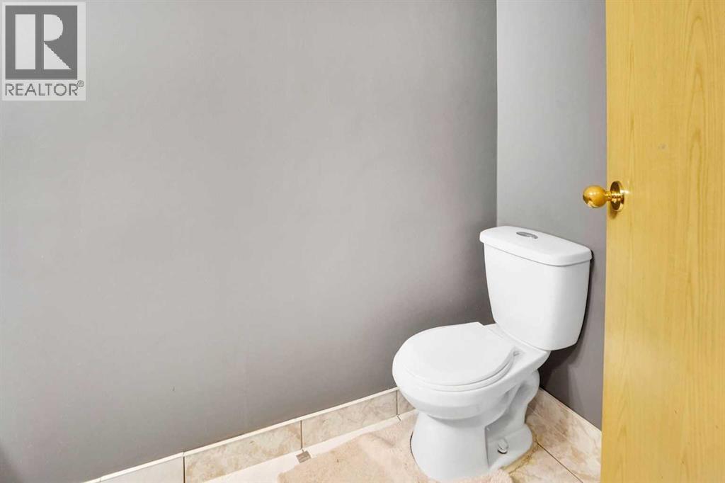 Single Family House 4 Level for Sale in  Laguna Way NE Monterey Park Calgary 