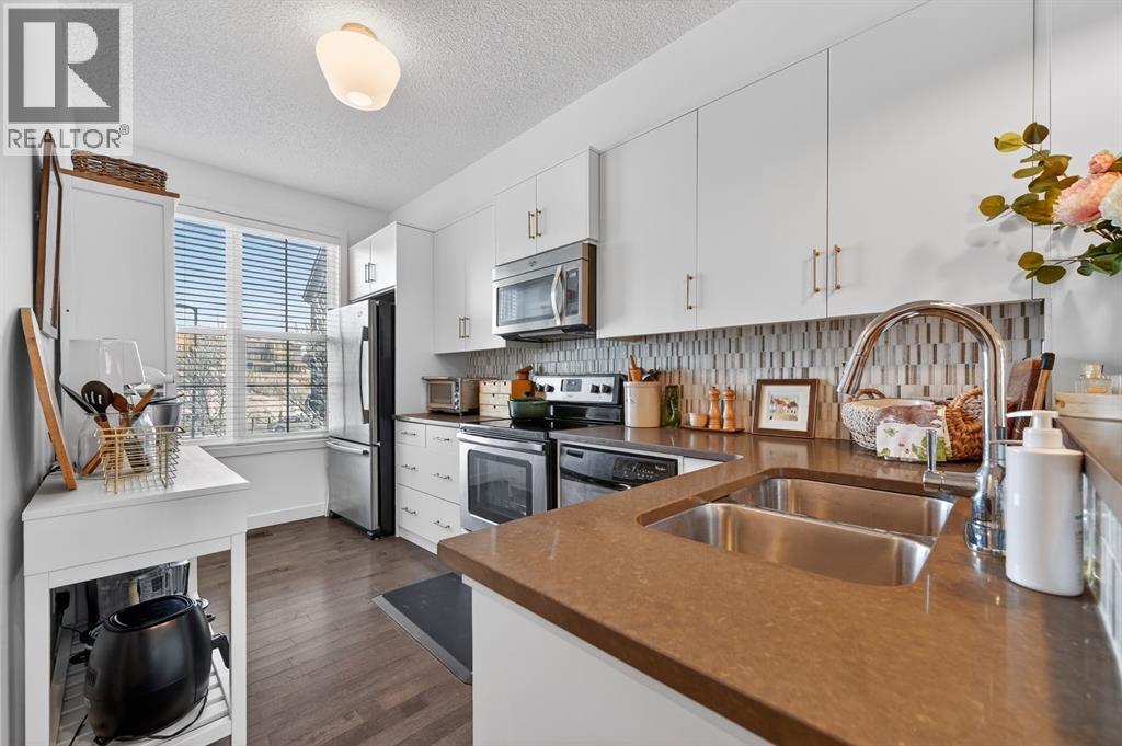 Single Family House for Sale in  Ascot Circle SW Aspen Woods Calgary 