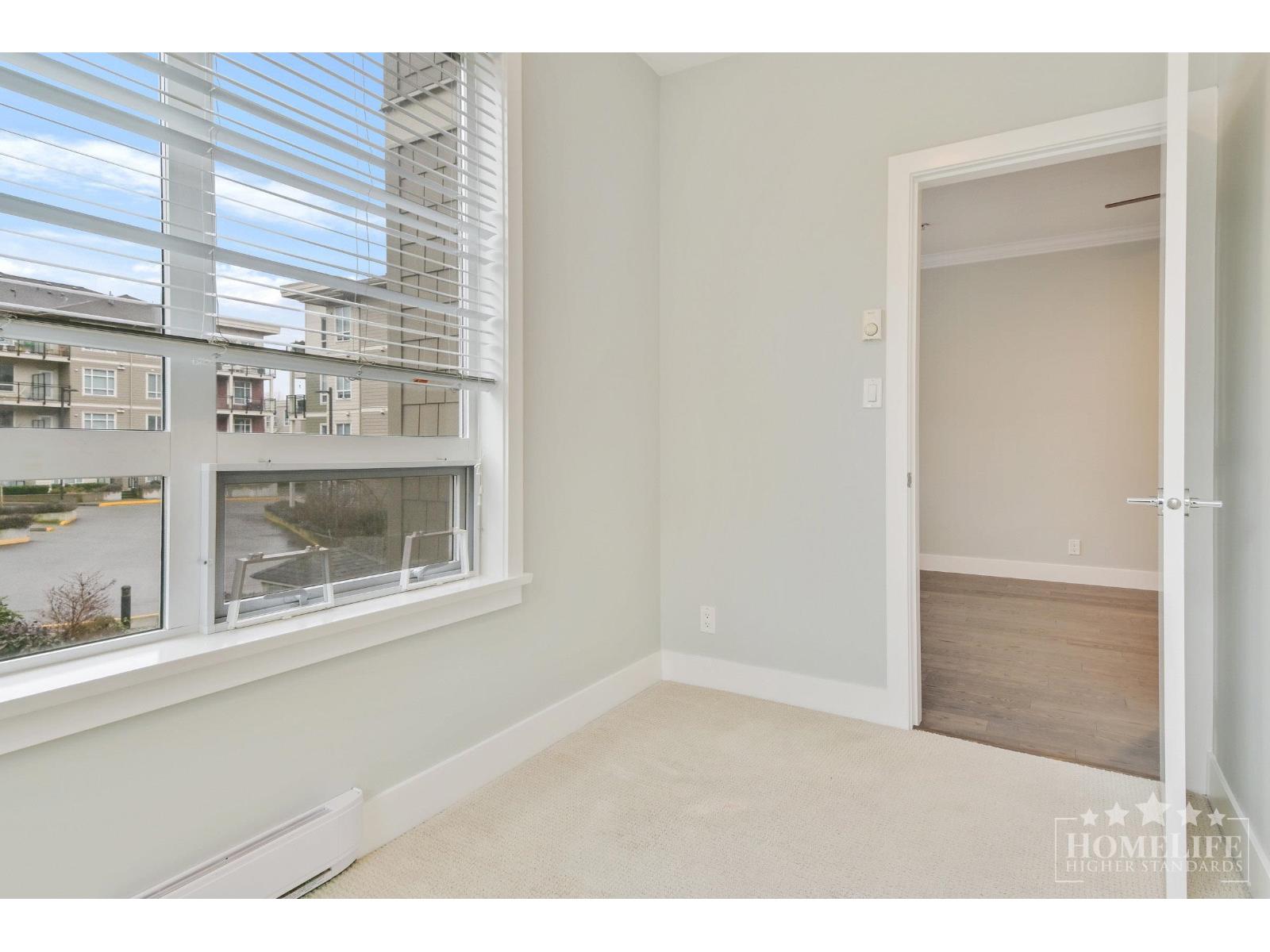 B209 20211 66 AVENUE, Langley