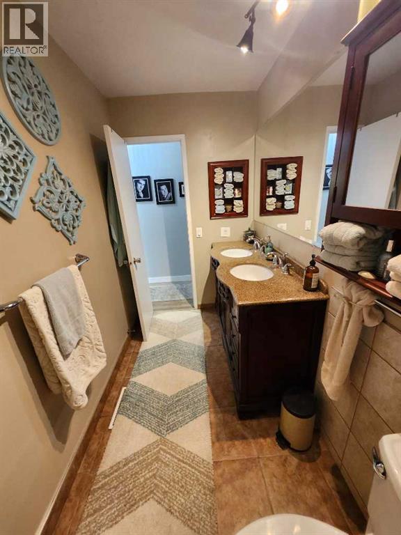 Single Family House 4 Level for Sale in  Addison Place SE Acadia Calgary 