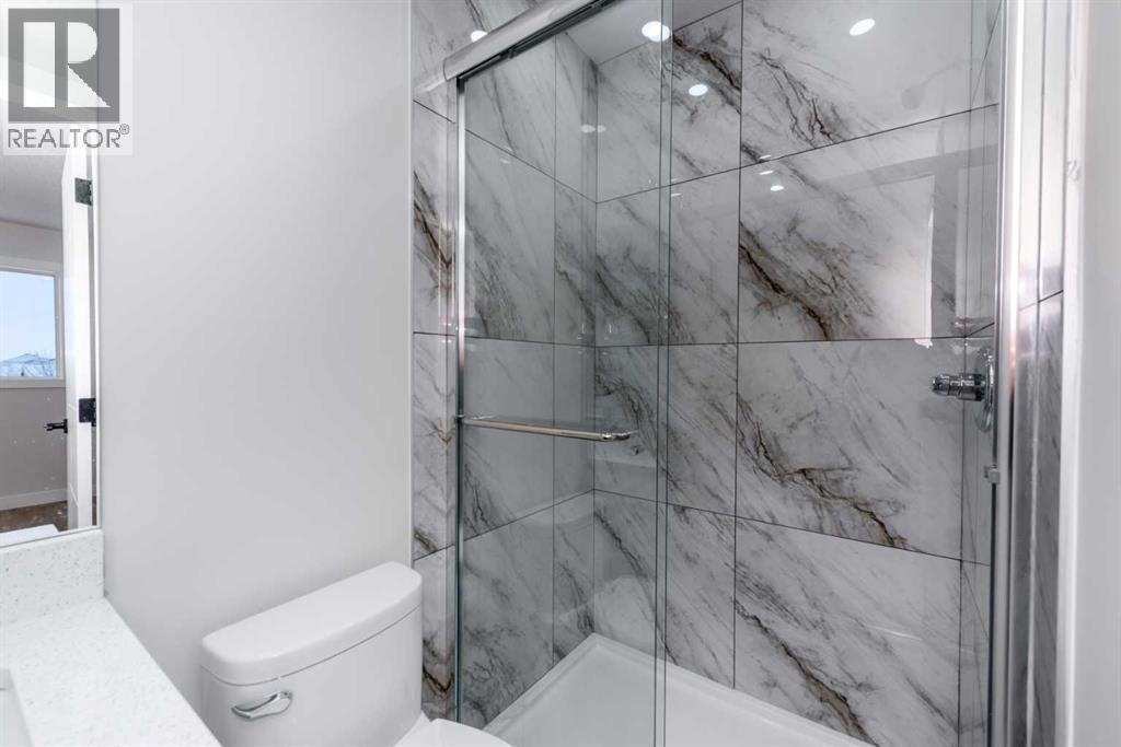 Single Family House Bi-level for Sale in  Laguna Way NE Monterey Park Calgary 