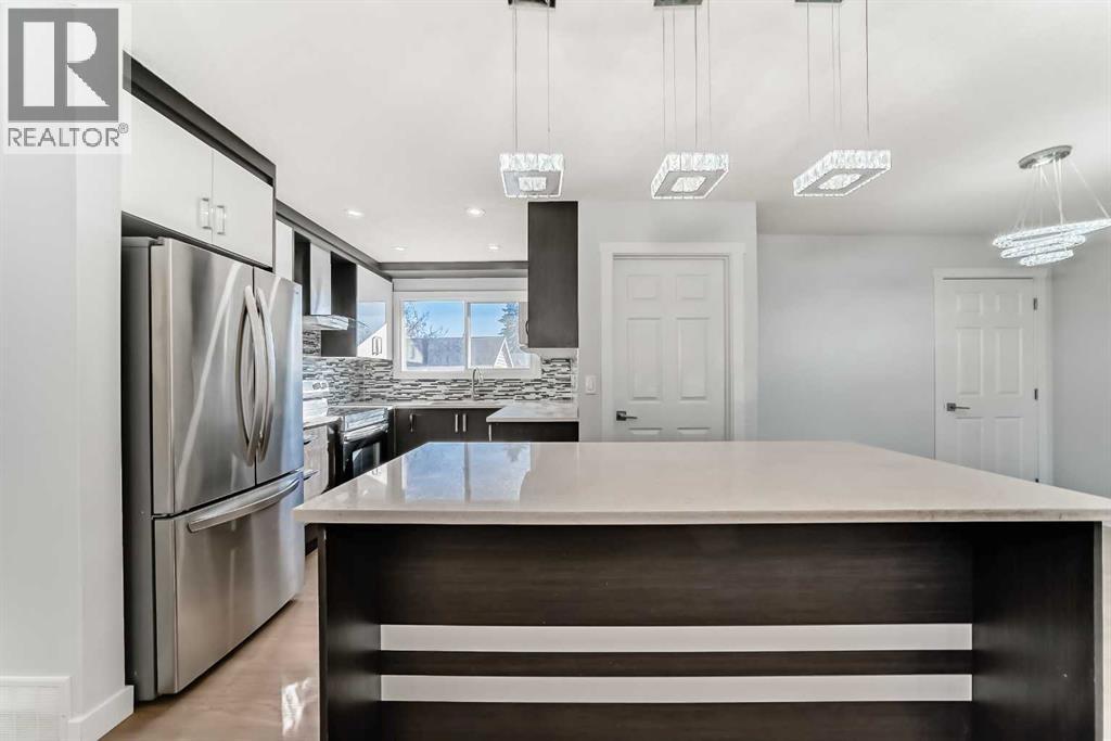 Single Family House Bungalow for Sale in  Pinecliff Way NE Pineridge Calgary 