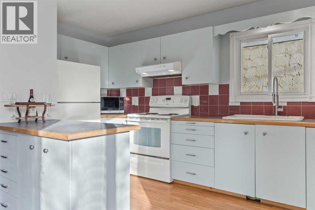 Single Family House for Sale in   Street NW Bowness Calgary 