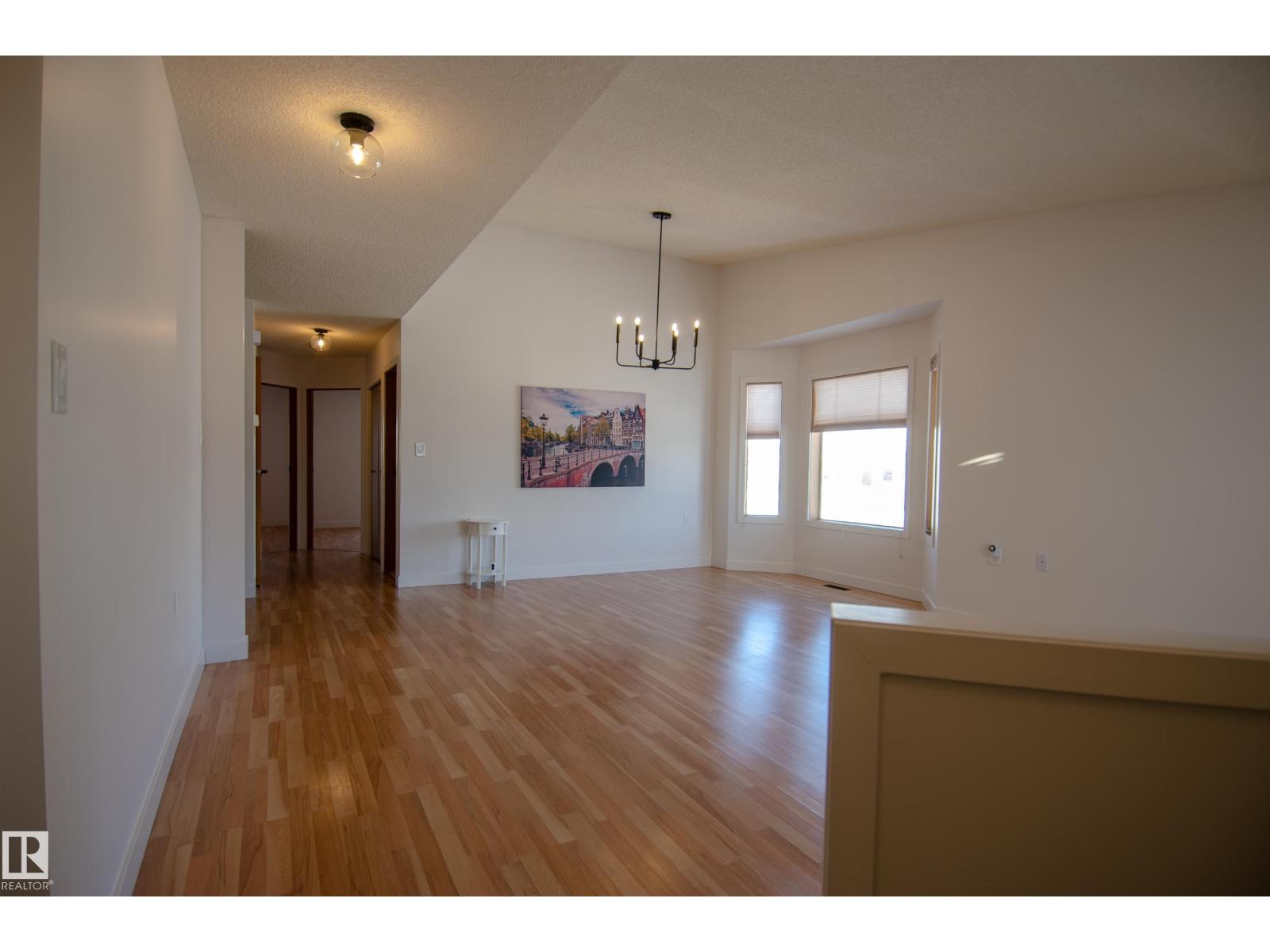 
          15571 59A Street NW
            <br/>
            <span>Edmonton</span>
            , 
            <span>AB</span>
             <span>T5Y2N9</span>
         - Photo 7