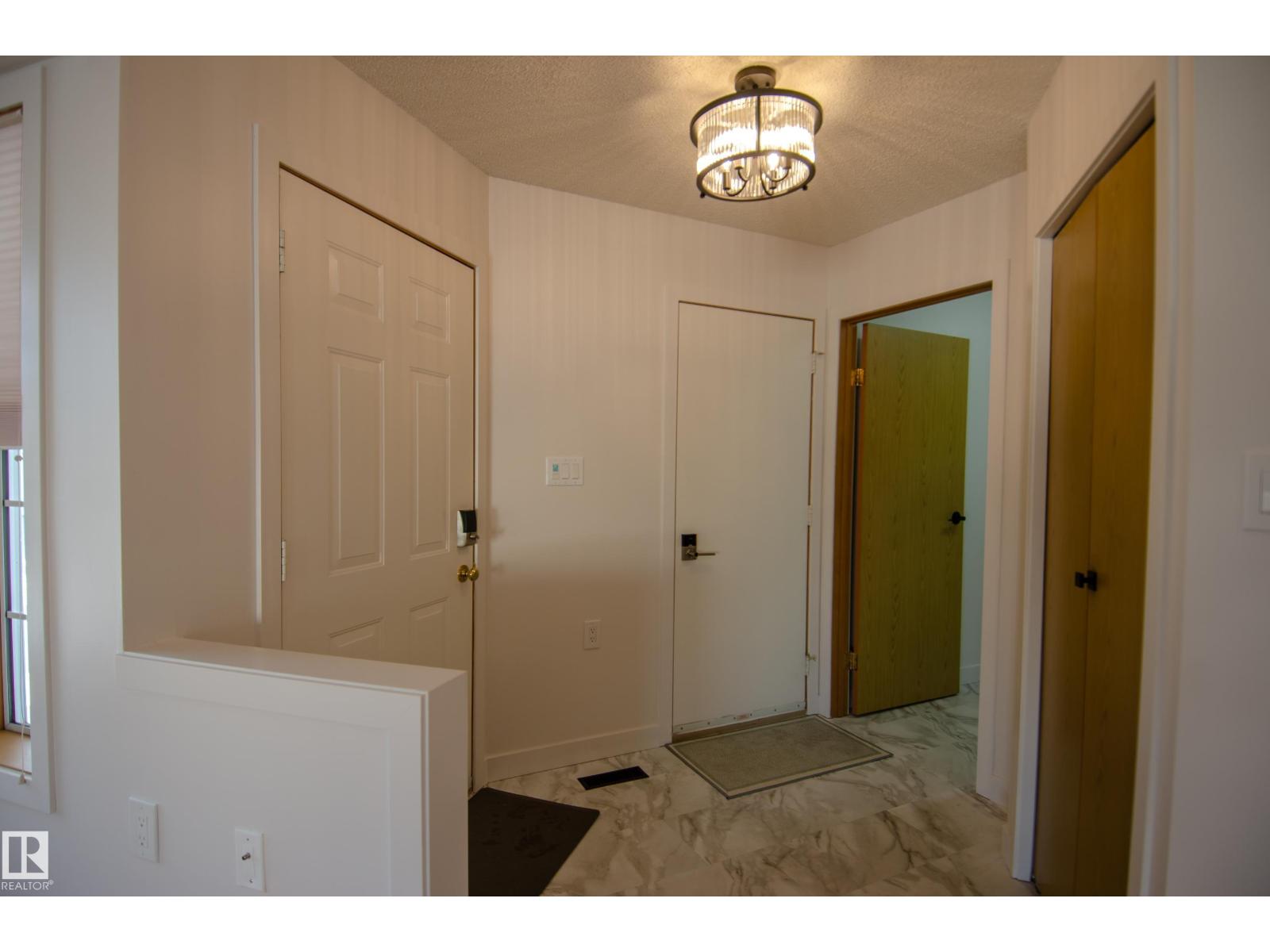 
          15571 59A Street NW
            <br/>
            <span>Edmonton</span>
            , 
            <span>AB</span>
             <span>T5Y2N9</span>
         - Photo 28