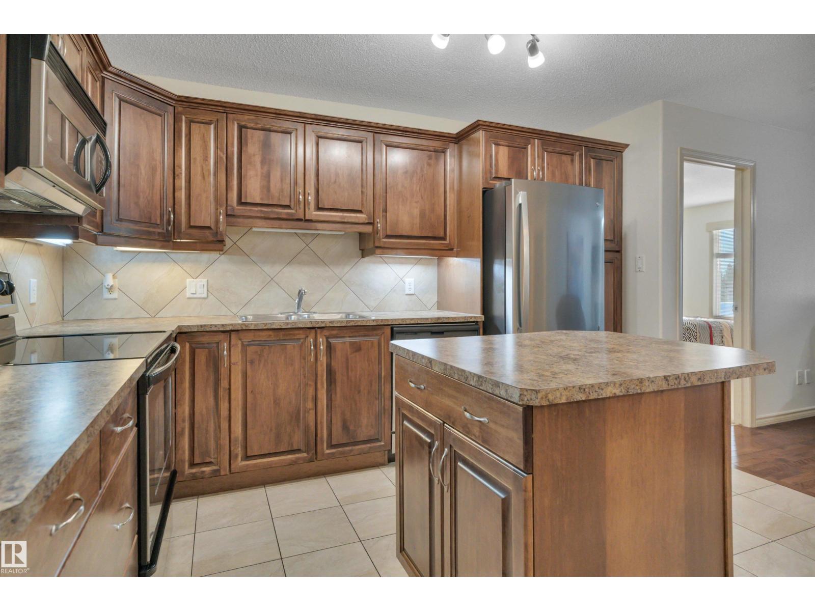 #119 16035 132 ST NW - 15