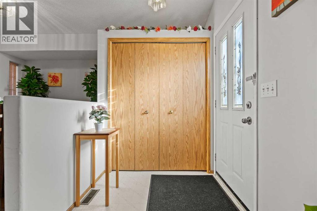 Single Family House 4 Level for Sale in  Laguna Way NE Monterey Park Calgary 