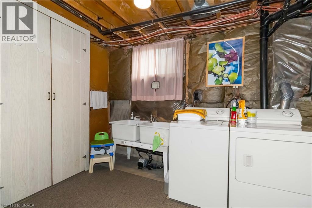 Laundry room featuring washing machine and dryer