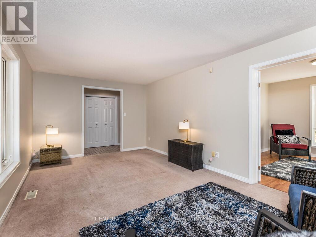 Spacious Living room facing front yard.