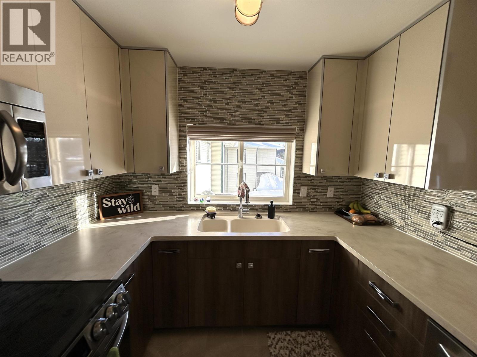 407 1638 6TH AVENUE, Prince George