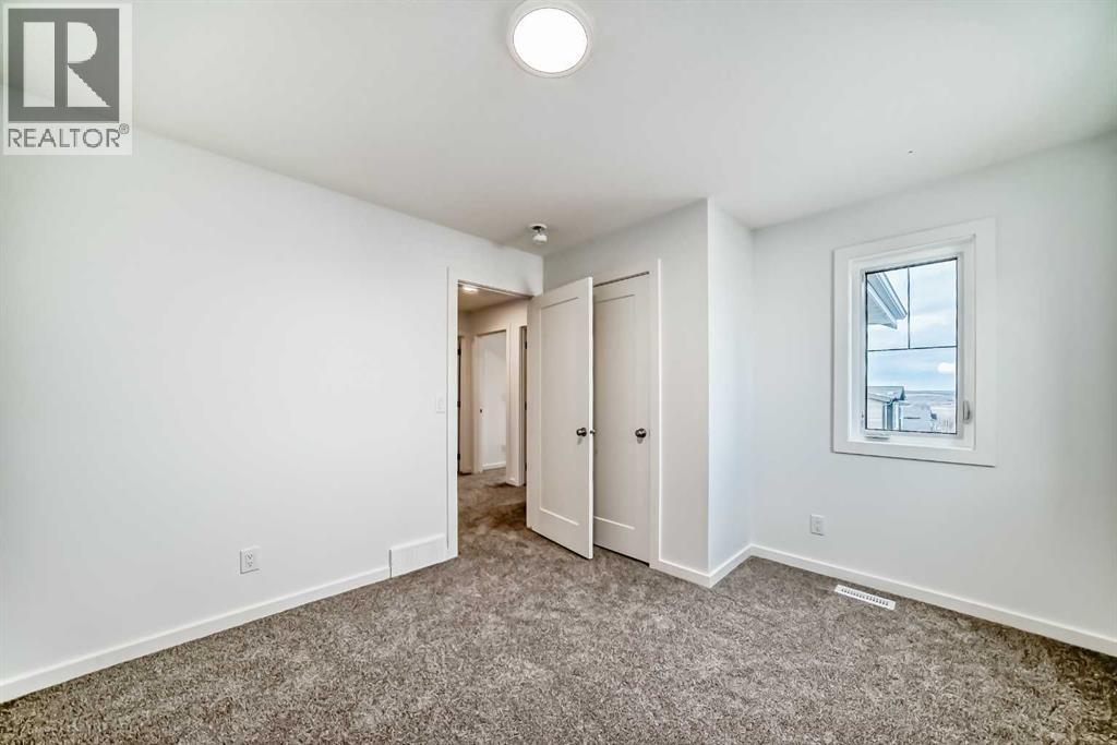 Single Family House for Sale in  Versant Way SW Alpine Park Calgary 