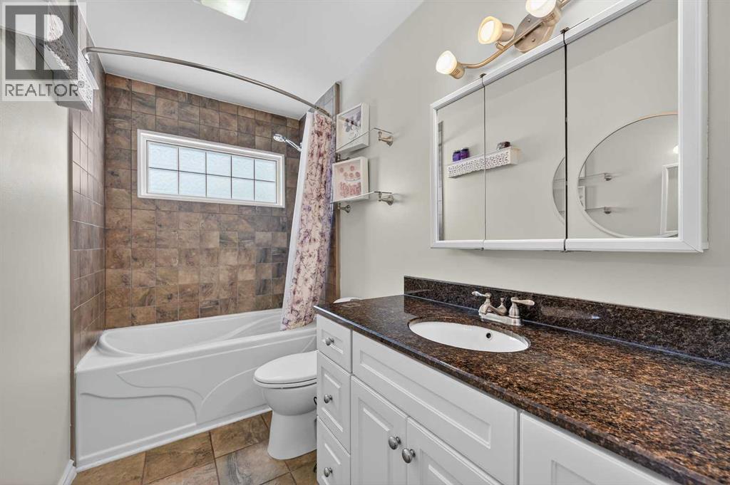 Single Family House Bi-level for Sale in  Allan Crescent SE Acadia Calgary 