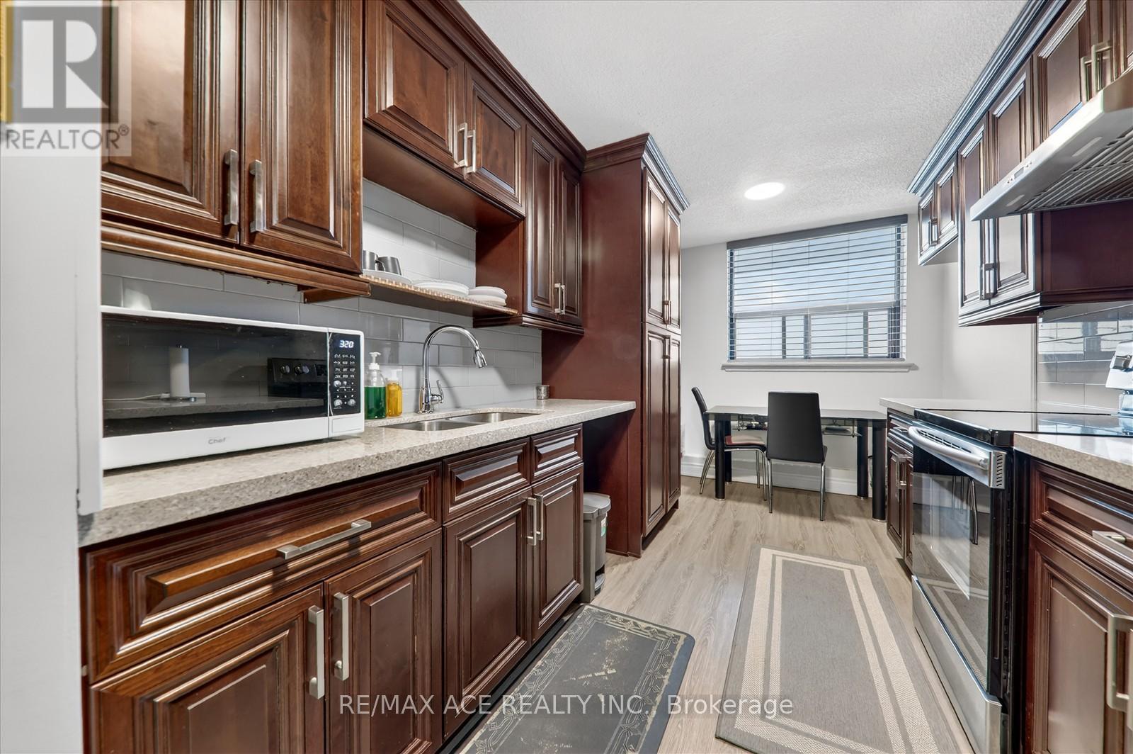 #1414 100 WINGARDEN COURT - 16