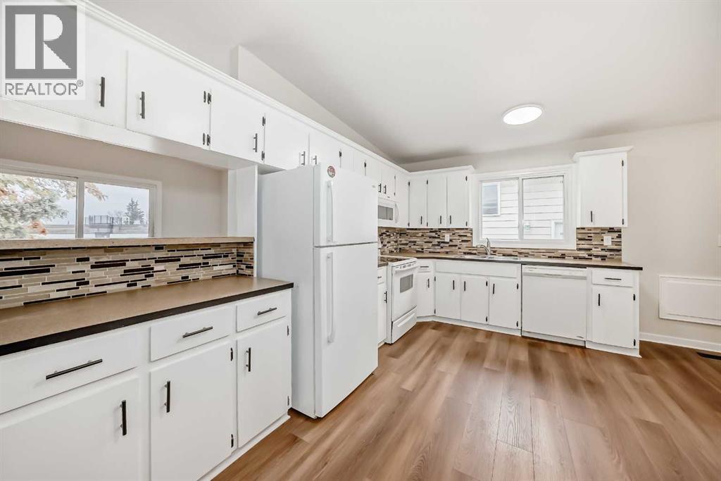 Single Family House 4 Level for Sale in   Street NW Dalhousie Calgary 