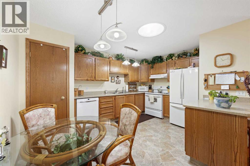 Single Family House Bungalow for Sale in  Arbour Cliff Close NW Arbour Lake Calgary 